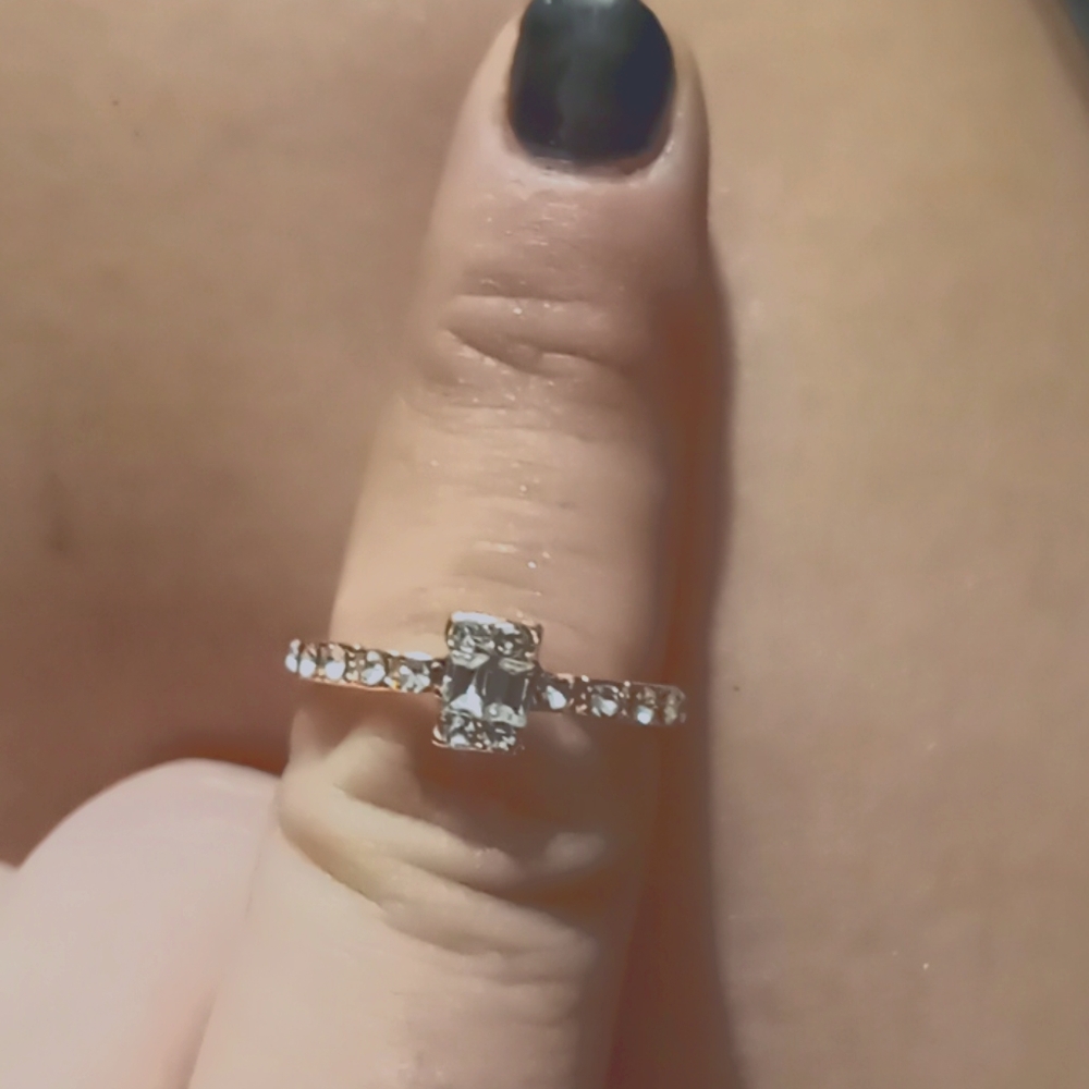 Rose gold white sapphire diamond with a solitaire